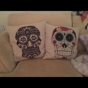 Two sugar skull pillow covers